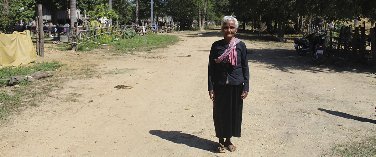 Photo: Putla standing on the same road where she stopped the trolleys in 2009
